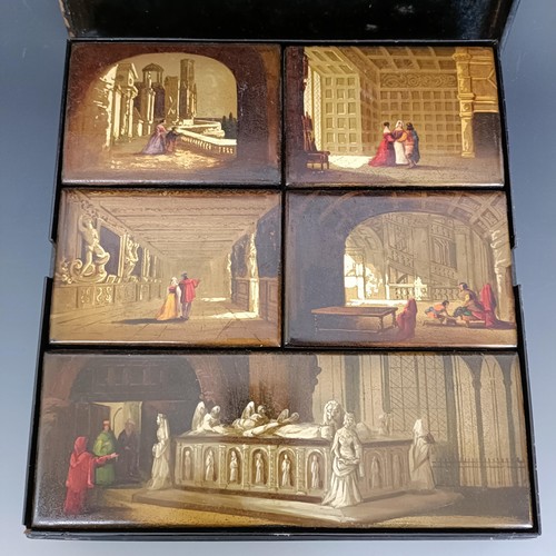 1146 - A Victorian papier mache games box and lid, decorated figures in interiors, opening to reveal four s... 