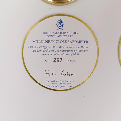 1023 - A Royal Crown Derby Millennium Globe Thermometer, limited edition number 267/1000, and a Royal Crown... 