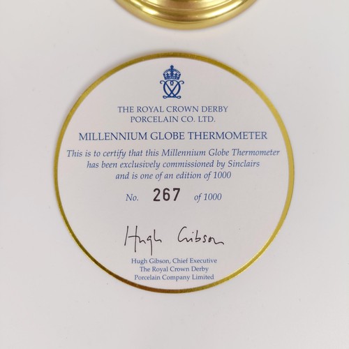 1023 - A Royal Crown Derby Millennium Globe Thermometer, limited edition number 267/1000, and a Royal Crown... 