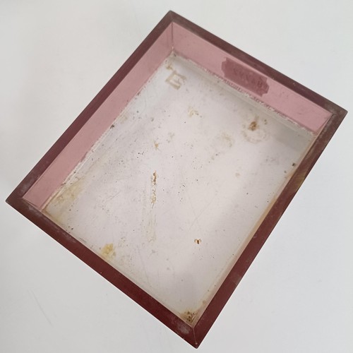 1069 - A Dunhill perspex box, 14 cm wide