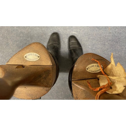 1106 - A pair of riding boots, with wooden trees, retail label for G Legg & Son, other riding boots and... 