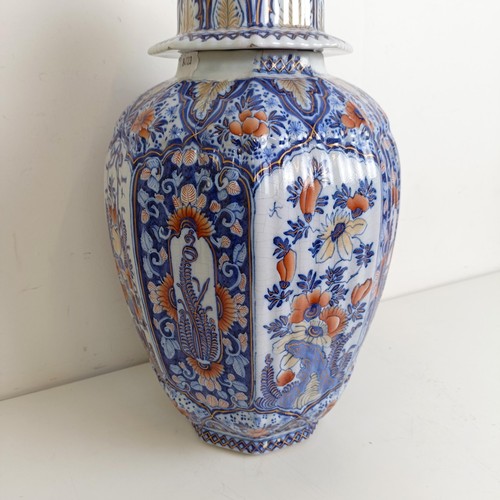 1084 - A Japanese style vase and cover, damaged and restored