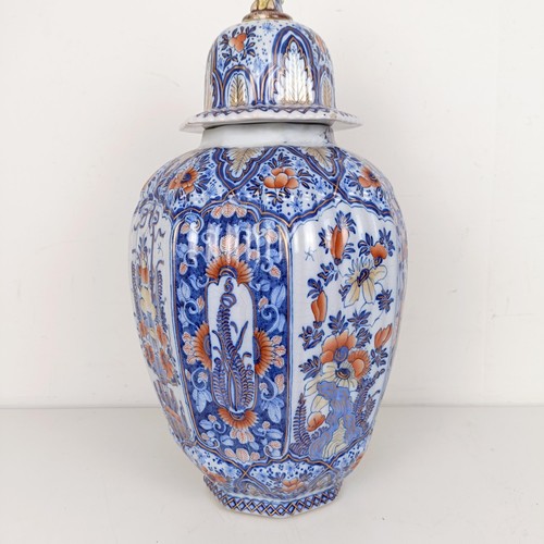 1084 - A Japanese style vase and cover, damaged and restored