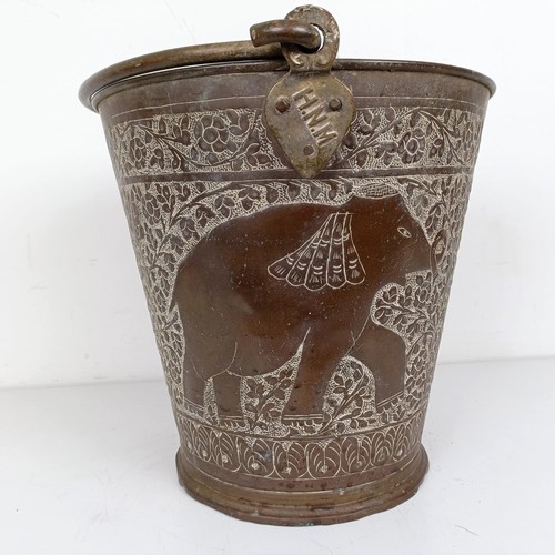 1086 - A Persian copper bucket, 60 cm high