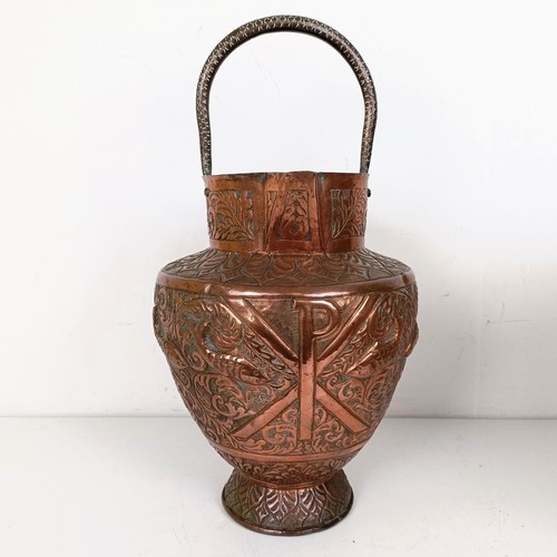 1087 - An Eastern copper jug, decorated fish, 46 cm high