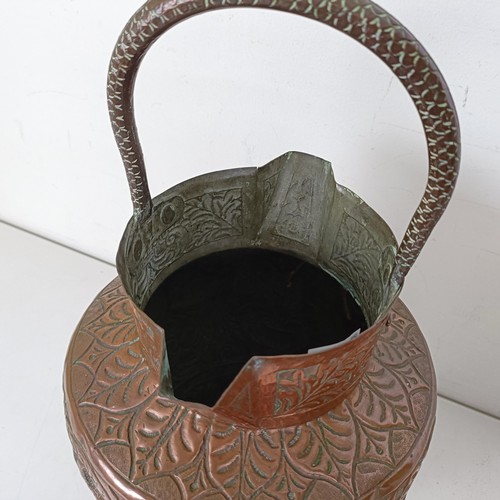 1087 - An Eastern copper jug, decorated fish, 46 cm high