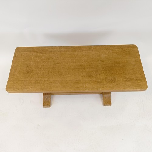 1201 - Robert Mouseman Thompson of Kilburn, a rectangular coffee table, with an adzed top, 37 cm deep, 91 c... 