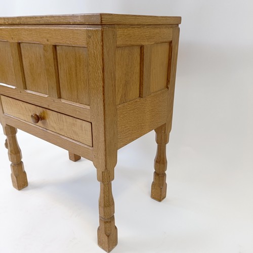 1202 - Robert Mouseman Thompson of Kilburn, a work box, with an adzed hinged top above a drawer, 32 cm deep... 