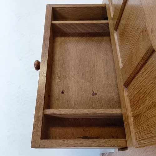 1202 - Robert Mouseman Thompson of Kilburn, a work box, with an adzed hinged top above a drawer, 32 cm deep... 