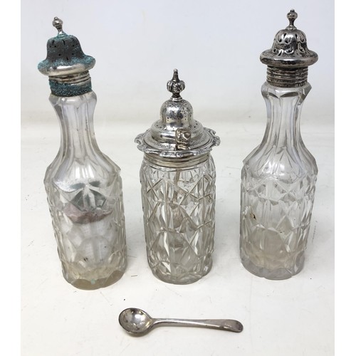 443 - A Victorian silver and mahogany cruet stand, with pierced decoration, London 1876, with three associ... 