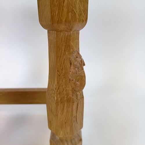 1213 - Robert Mouseman Thompson of Kilburn, a stool, with an adzed top, 27 cm deep, 38 cm high, 40 cm wide