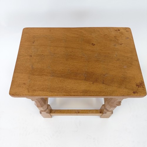 1213 - Robert Mouseman Thompson of Kilburn, a stool, with an adzed top, 27 cm deep, 38 cm high, 40 cm wide