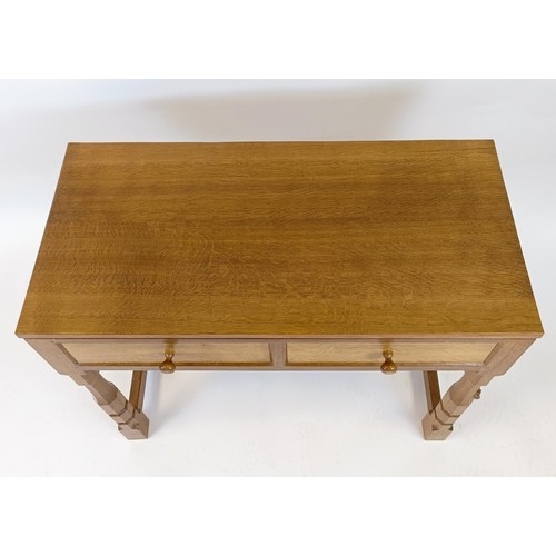 1217 - Robert Mouseman Thompson of Kilburn, a side table, with two drawers, 45 cm deep, 74 cm high, 91 cm w... 