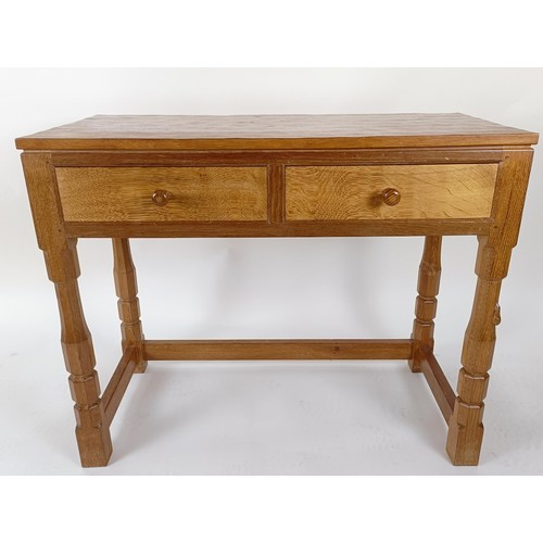 1217 - Robert Mouseman Thompson of Kilburn, a side table, with two drawers, 45 cm deep, 74 cm high, 91 cm w... 