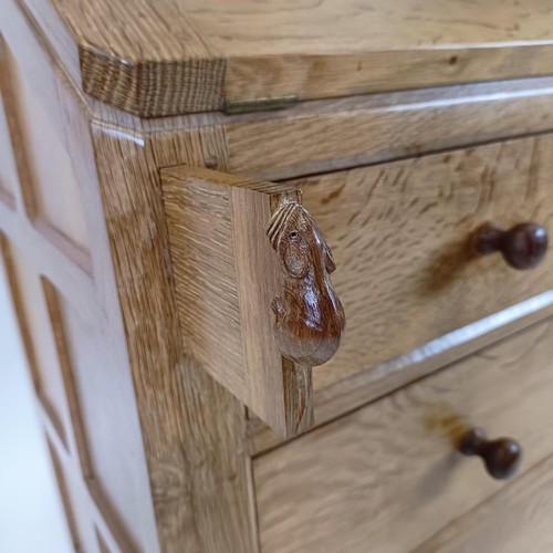 1218 - Robert Mouseman Thompson of Kilburn, a bureau, with a hinged top to reveal a fitted interior, above ... 