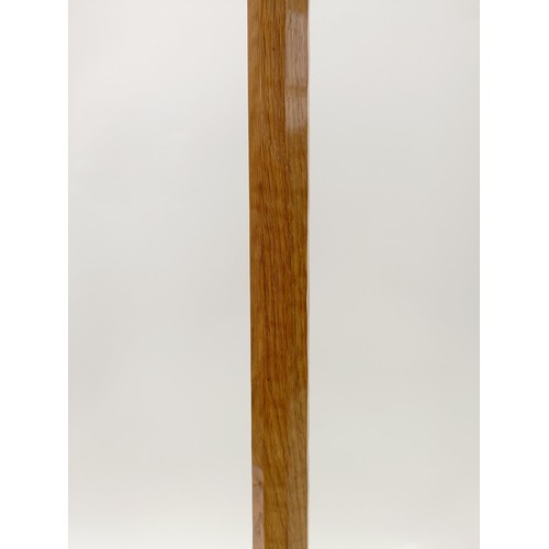 1220 - Robert Mouseman Thompson of Kilburn, a standard lamp, 139 cm high