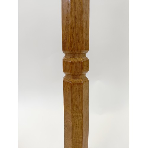 1220 - Robert Mouseman Thompson of Kilburn, a standard lamp, 139 cm high