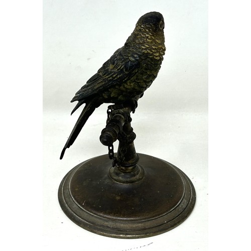 1138 - A cold painted bronze figure of a parrot on a perch, 13 cm high