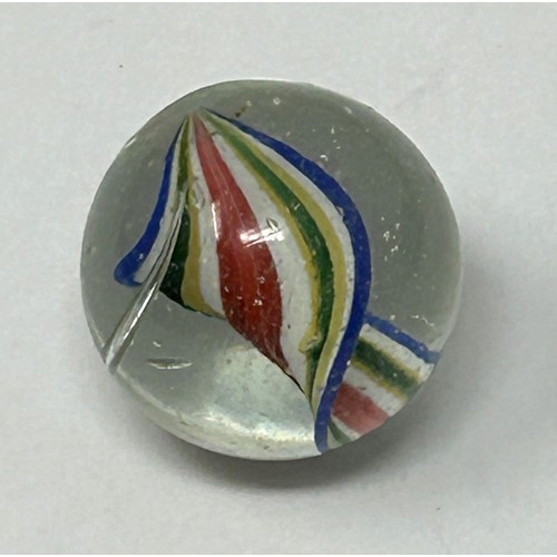 1143 - A 19th century solitaire board, with marbles, mostly coloured