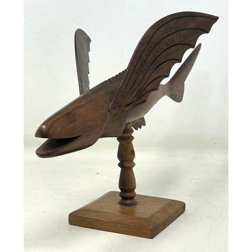 1144 - A Pitcairn Island carved wood flying fish, 'Souvenir from Pitcairn Island' and 'Made by Ernest Clark... 