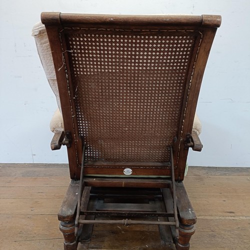 1270 - A Victorian invalids adjustable chair, by Carter of London, with enamel makers plaque