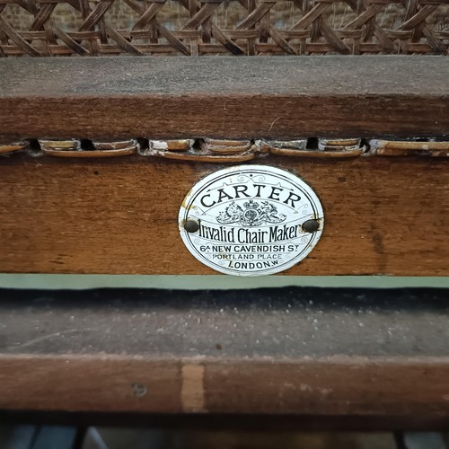 1270 - A Victorian invalids adjustable chair, by Carter of London, with enamel makers plaque