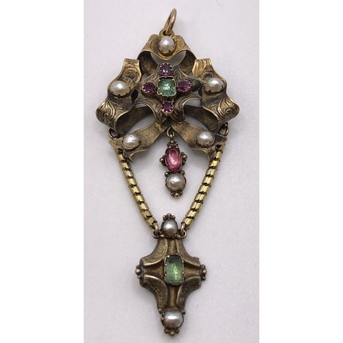 819 - A Victorian yellow metal, peridot red stone and pearl memorial pendant