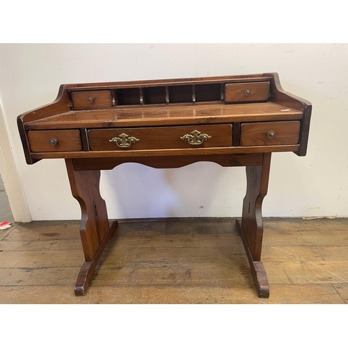 1238 - A mahogany chest, having four drawers, 90 cm wide, a serpentine chest, a desk, a side table, and a c... 