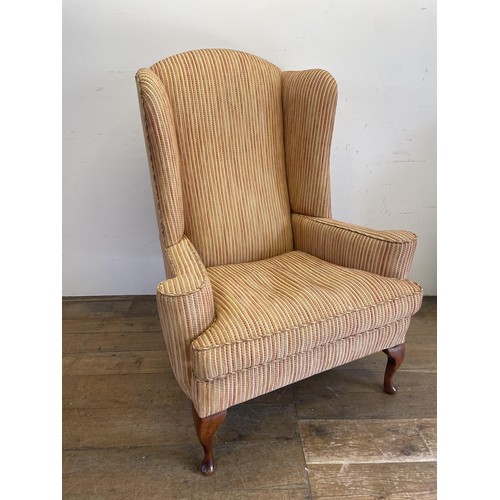 1244 - A wingback armchair