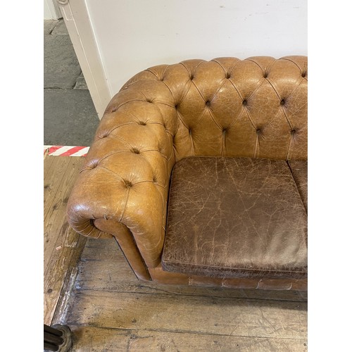 1276 - A pair of Chesterfield type brown leather sofas, 170 cm wide