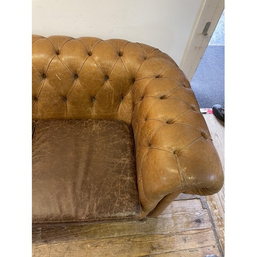 1276 - A pair of Chesterfield type brown leather sofas, 170 cm wide