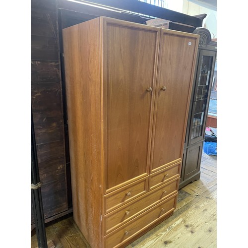 1287 - An oak bookcase, with leaded glazed doors, 193 cm high, 85 cm wide, and a G-plan wardrobe (2)