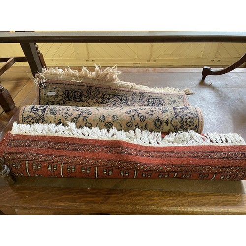 1281 - A 19th century mahogany pole screen, a mahogany side table, an oak oval table, a trunk, and two rugs