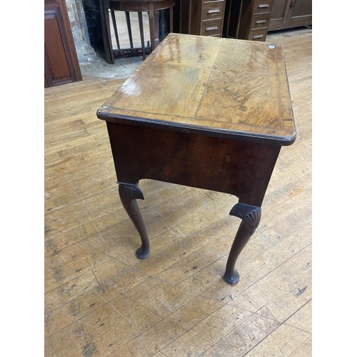 1295 - An 18th century style walnut lowboy, 74 cm wide