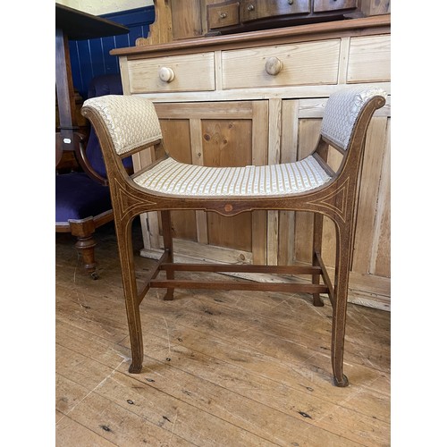 1299 - An early 20th century piano stool, 64 cm wide, and a dressing mirror (2)