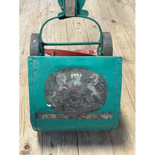 1261 - A Ransomes painted garden push along mower and grass box