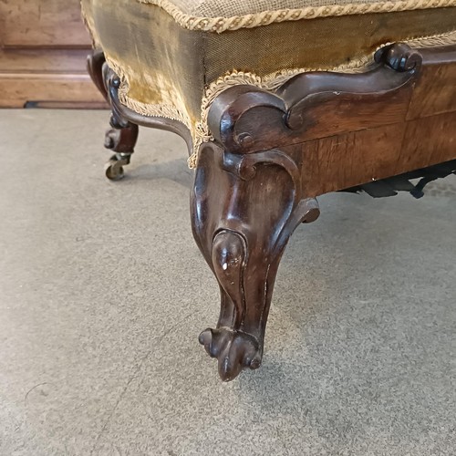 1294 - An early Victorian rosewood chair, with a needlework back and seat