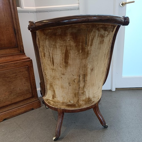 1294 - An early Victorian rosewood chair, with a needlework back and seat