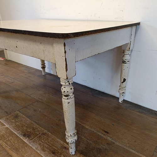 1292 - A kitchen table, with a later formica top, 137 cm wide, and a painted pine cupboard (2)