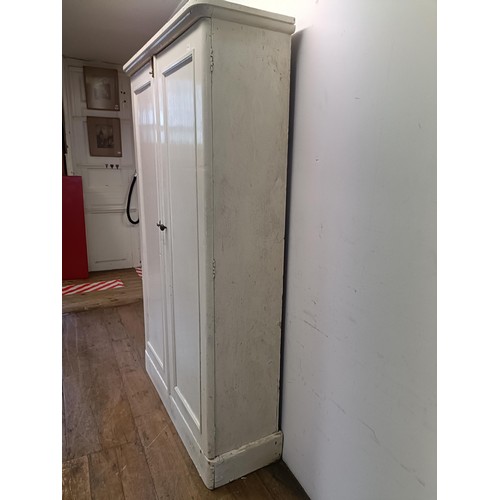 1292 - A kitchen table, with a later formica top, 137 cm wide, and a painted pine cupboard (2)