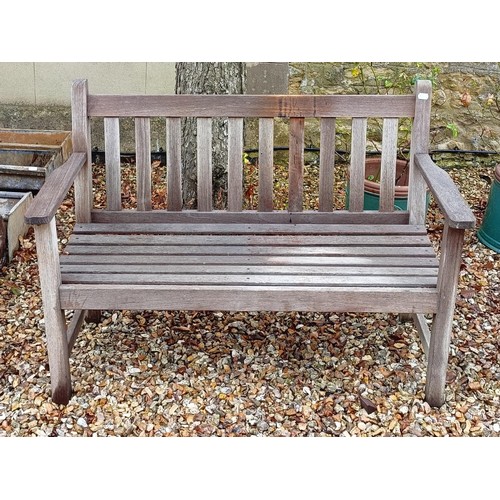 1371 - A teak garden bench, 123 cm wide, and a painted garden seat