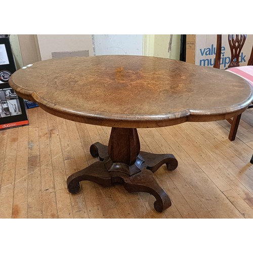 1312 - A 19th century loo table, veneered in burr walnut, 130 cm wide