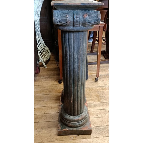 1310 - A pair of painted Ionic style columns, 76 cm high