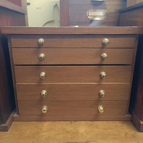 1236 - A collectors table top chest, of five drawers, 42 cm wide, and two others similar, 35.5 cm and 44 cm... 