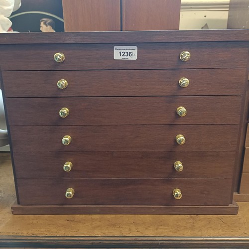 1236 - A collectors table top chest, of five drawers, 42 cm wide, and two others similar, 35.5 cm and 44 cm... 