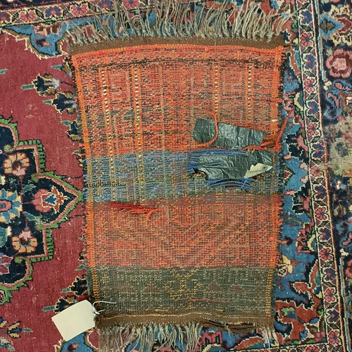 1245 - A red ground rug, 210 x 116 cm, a prayer mat, 61 x 52 cm, and another, 61 x 44 cm (3)