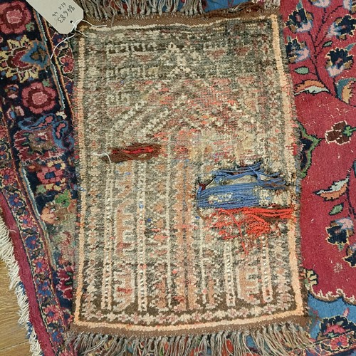 1245 - A red ground rug, 210 x 116 cm, a prayer mat, 61 x 52 cm, and another, 61 x 44 cm (3)