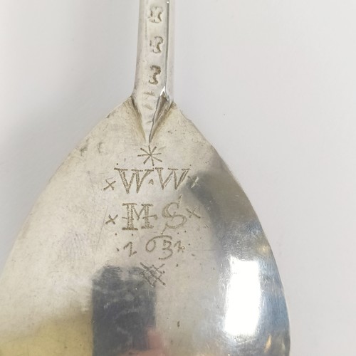 52 - A late 16th/early 17th century silver Apostle spoon, with a St Thomas knop, initialled and dated 163... 