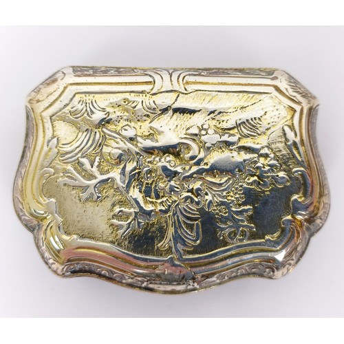 447 - A Continental silver coloured metal snuff box, of shaped rectangular form, embossed figures , 2.4 oz... 