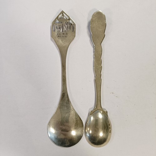 86 - Assorted silver coloured metal and other travel/commemorative spoons, some with enamel decoration